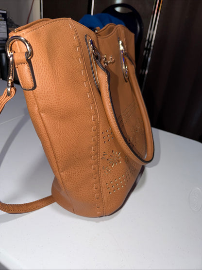 LerssaCi Tan Handbag With perforated floral cutouts and gold-toned hardware.