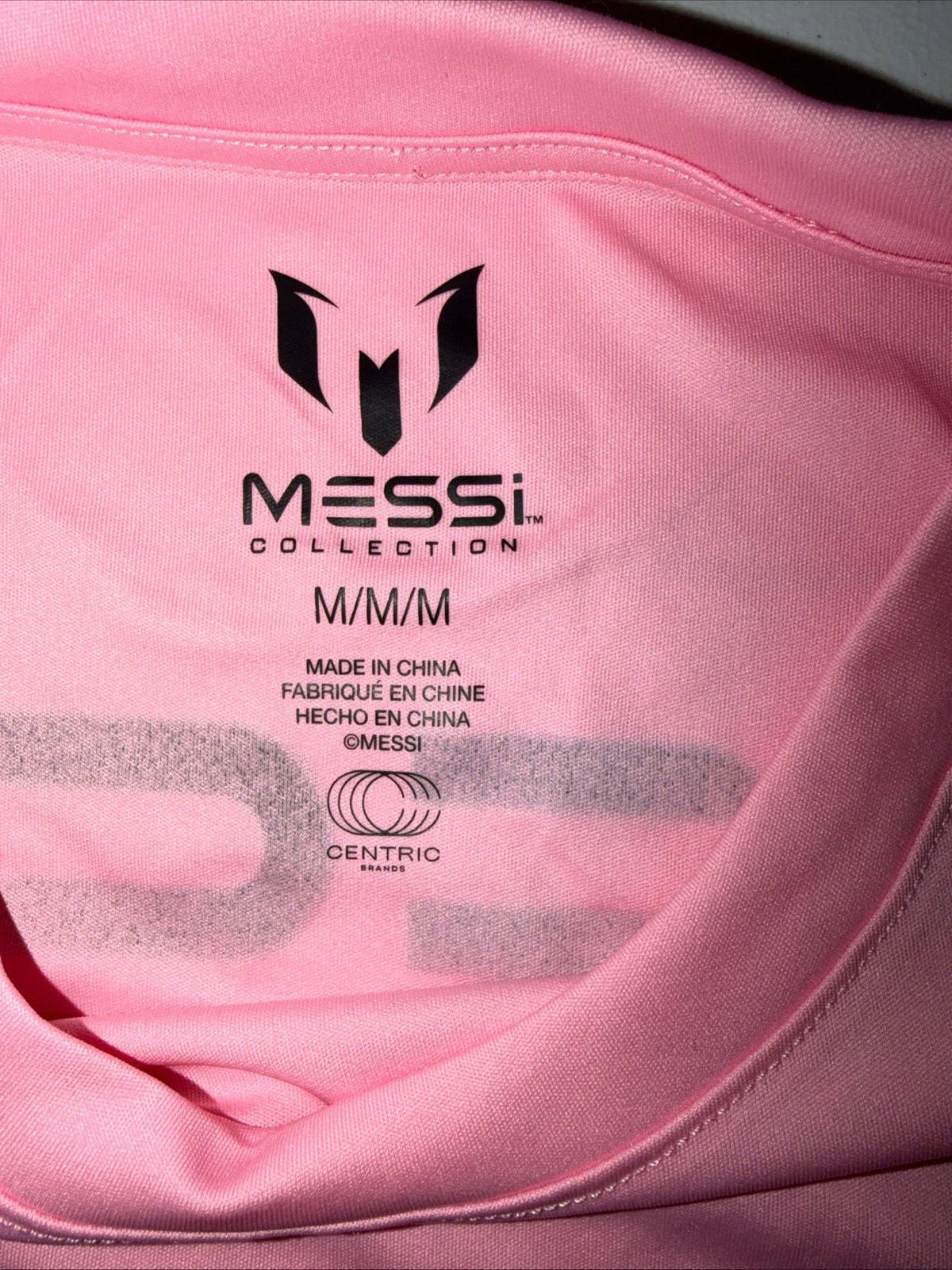 Pink Adidas Messi Jersey Top Features a prominent black logo graphic Size M