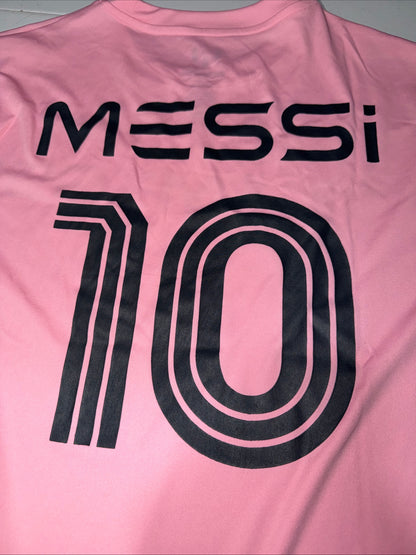 Pink Adidas Messi Jersey Top Features a prominent black logo graphic Size M